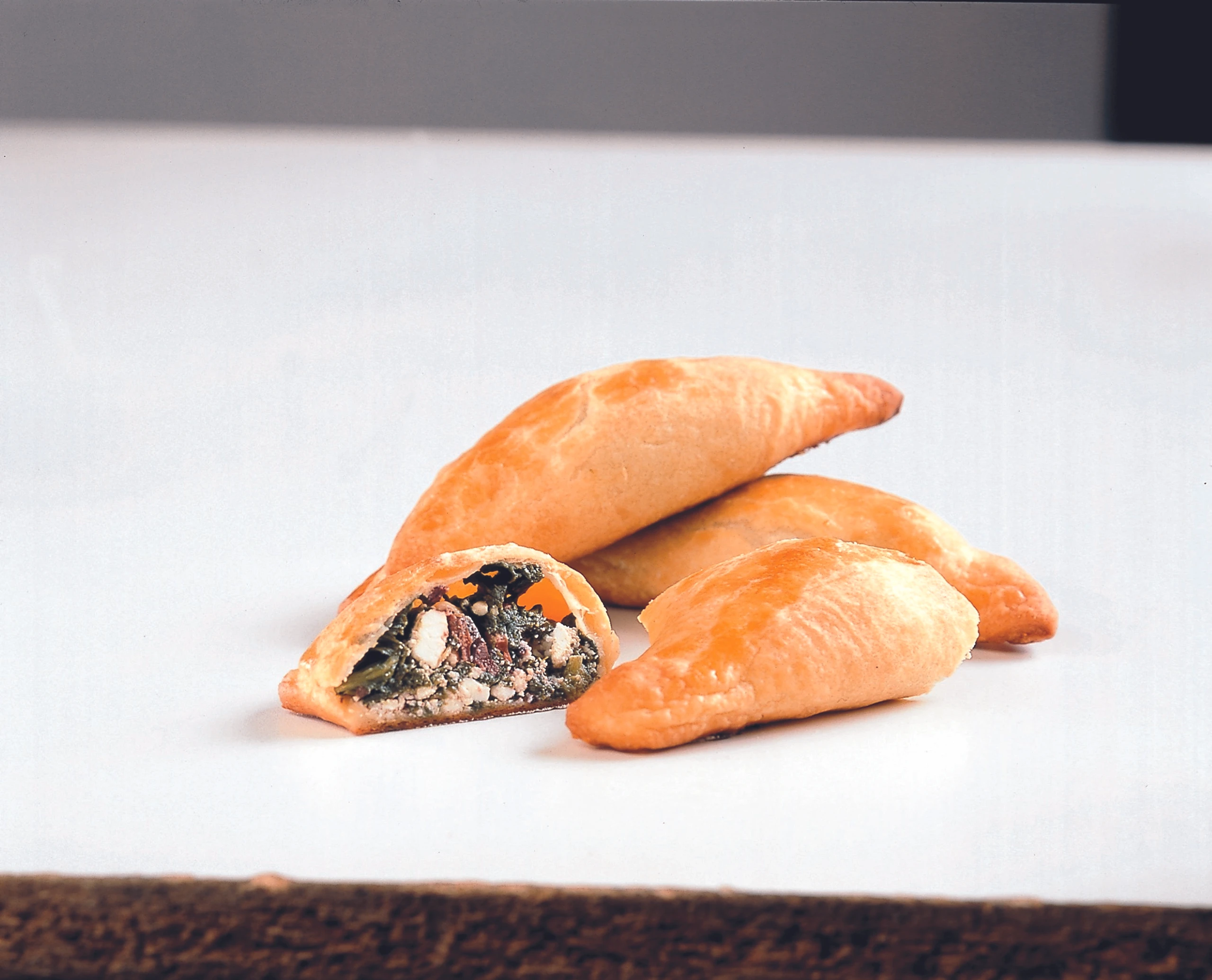 Topfenteig-Tascherl mit Spinat und Schafkäse