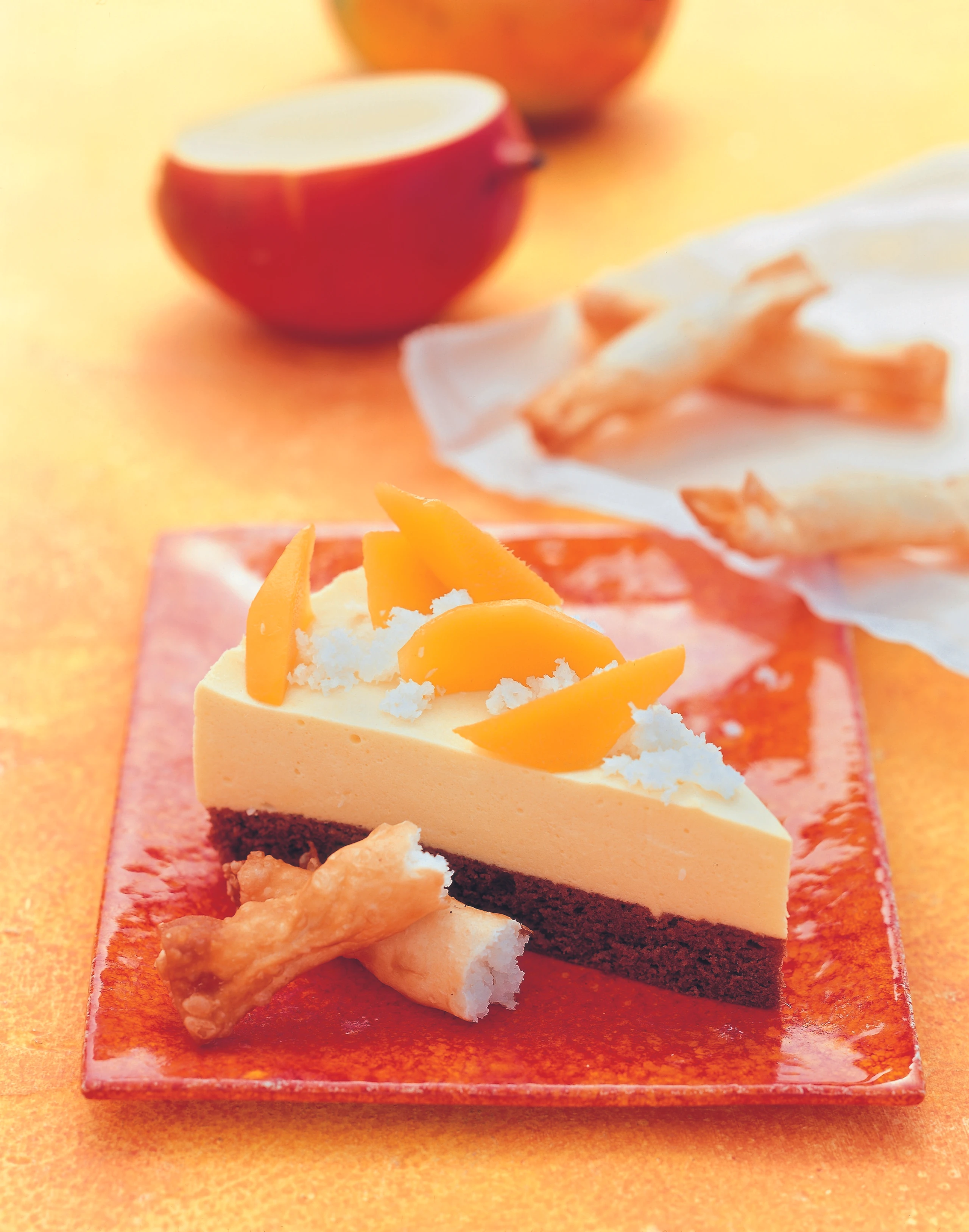 Mangotorte mit Kokosröllchen