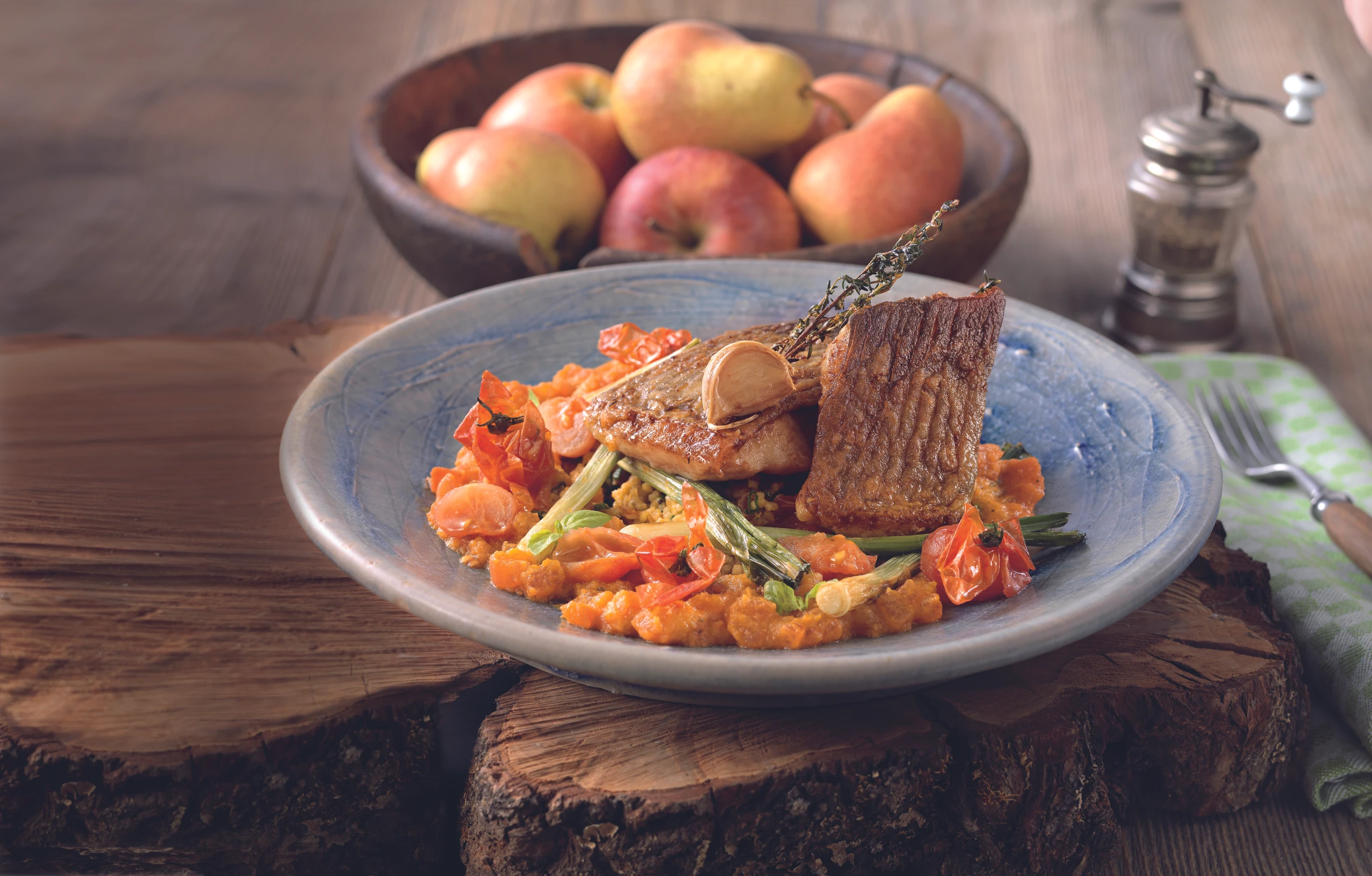 Waller mit Couscous und Paradeisragout