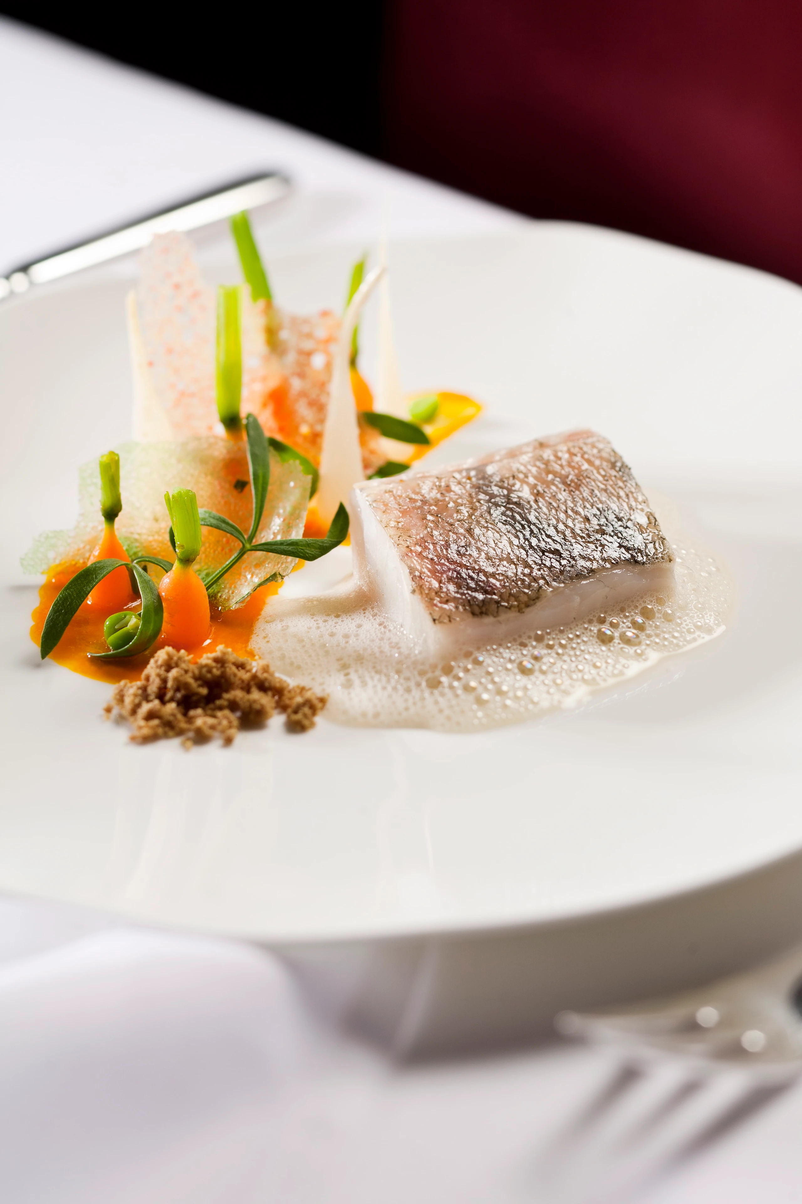 Zander mit jungen Karotten und Eiszapfen