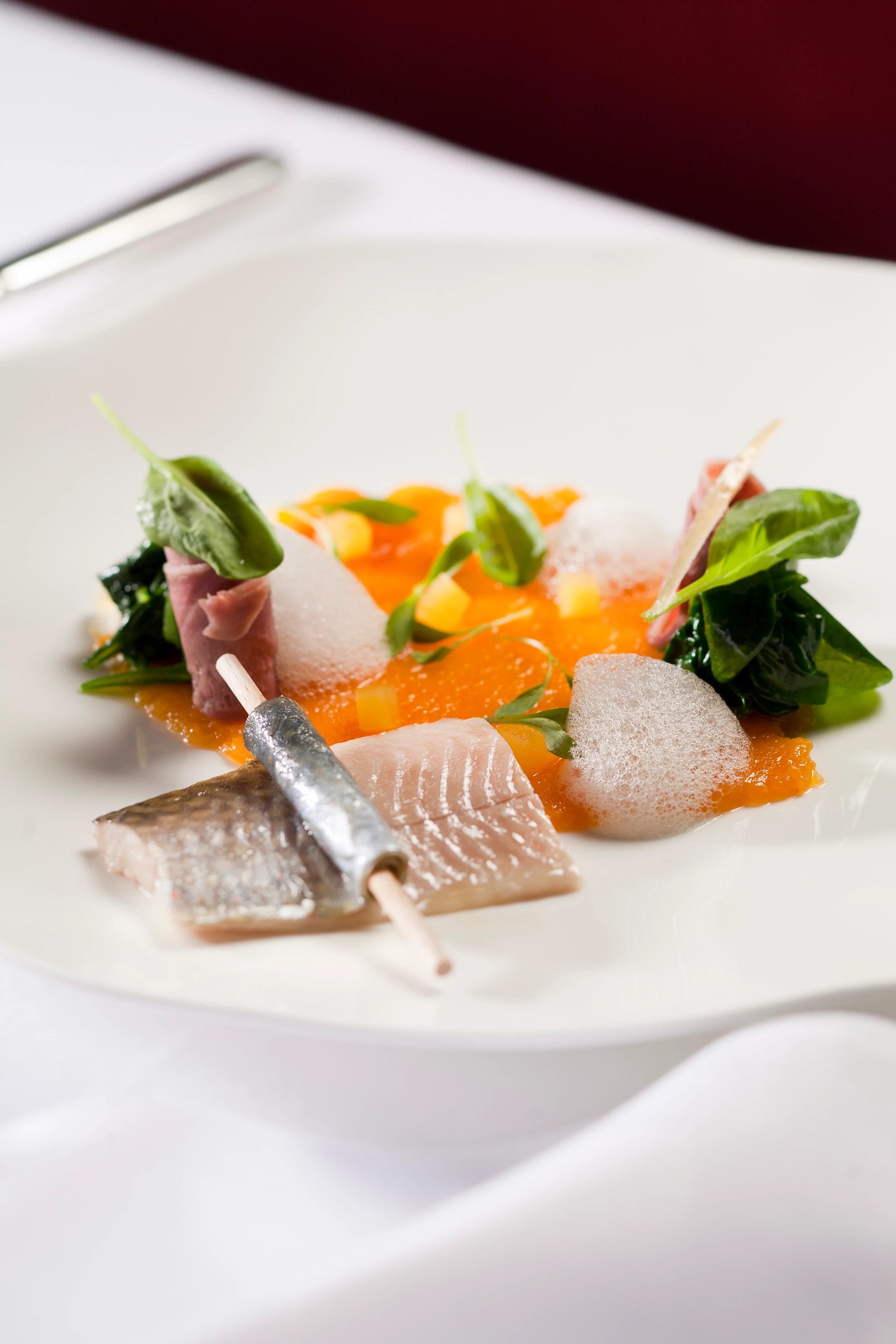 Geräucherter Huchen mit Kalbszunge und Kürbis