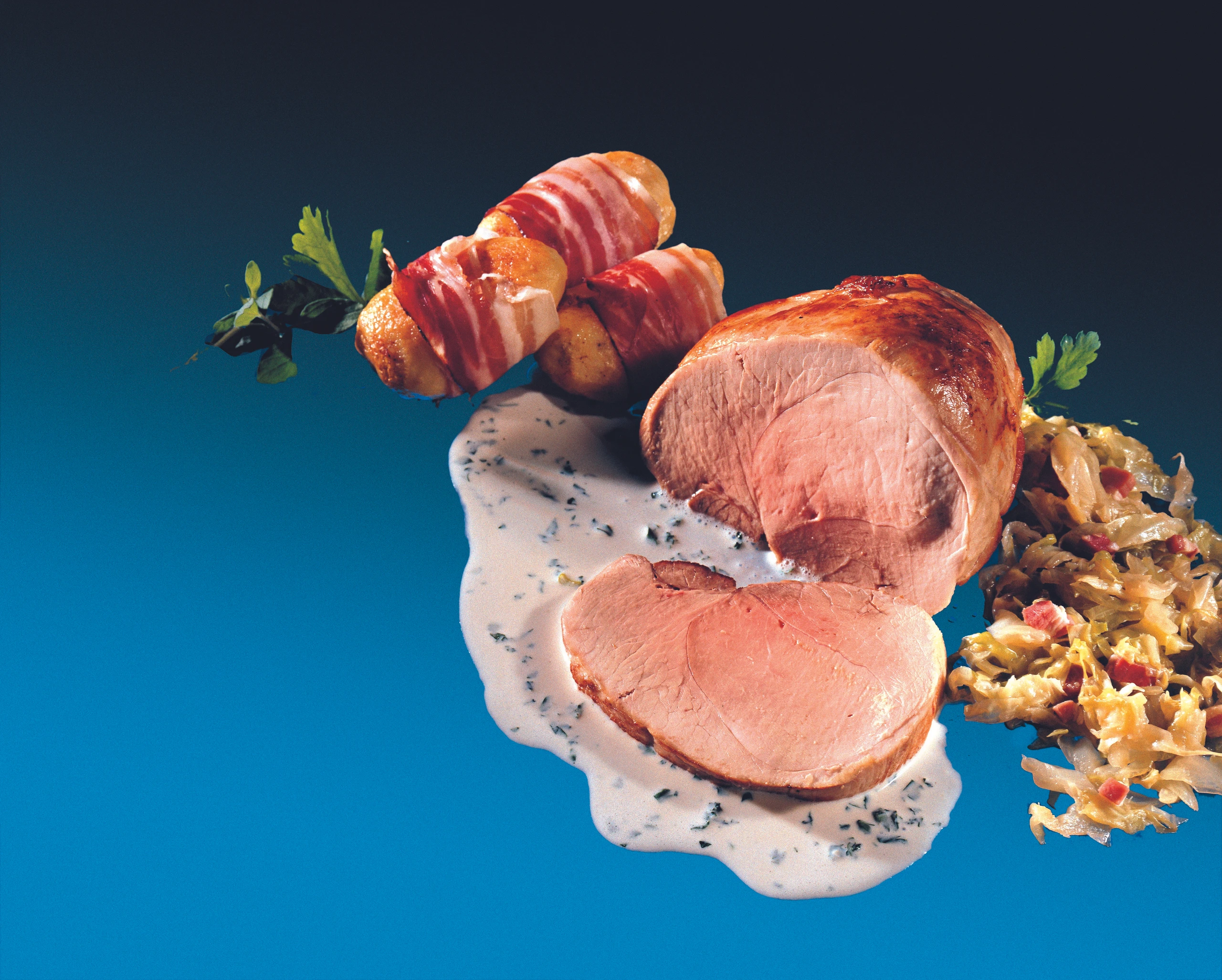 Schweinsbraten mit Knoblauch-Mandelsauce