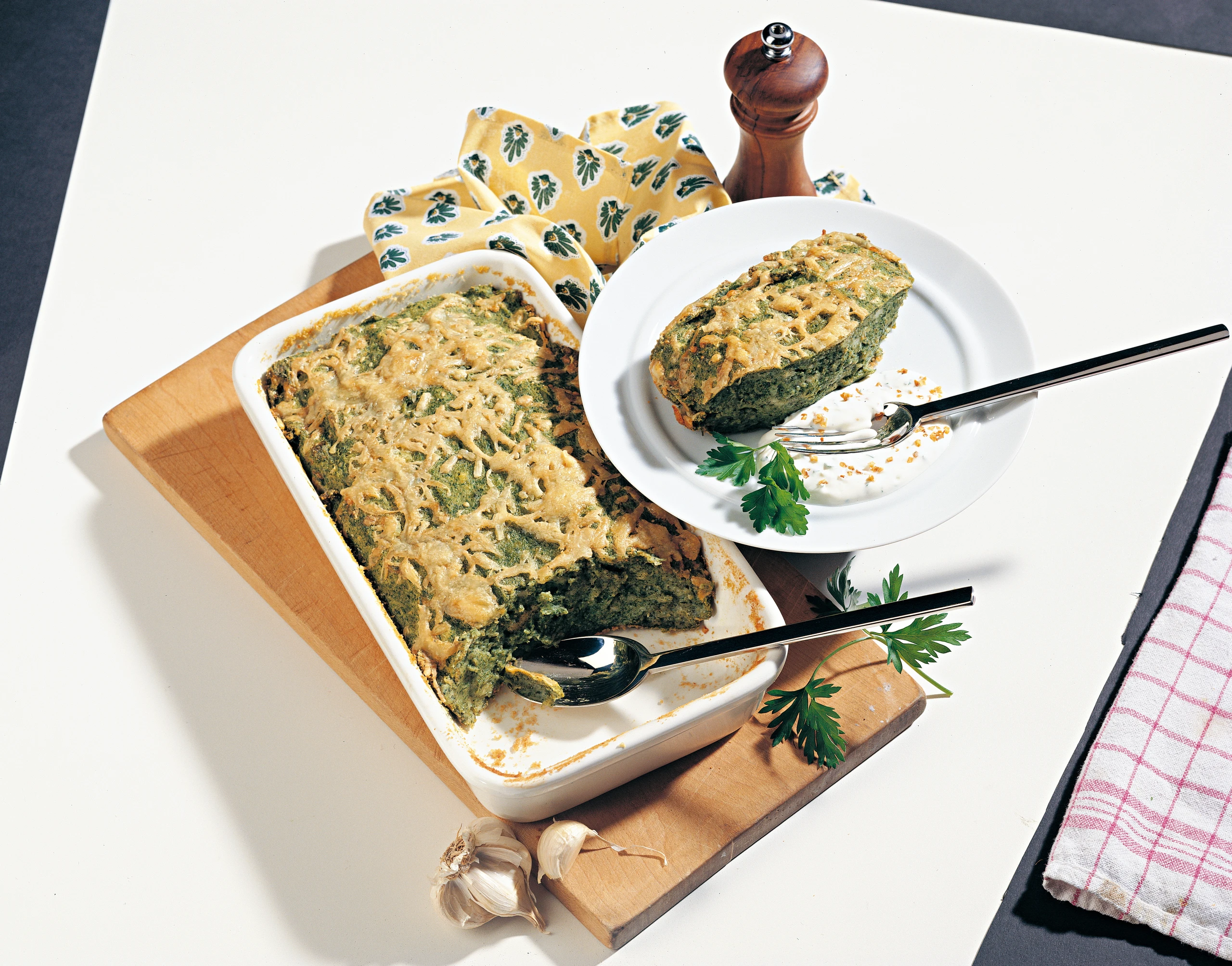 Spinatauflauf mit Käse überbacken