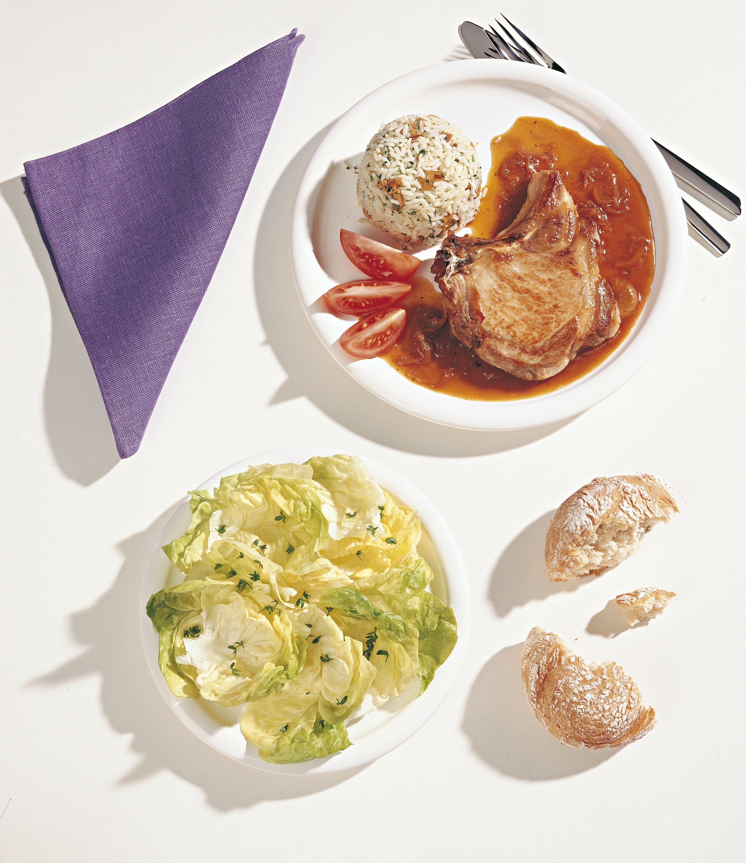 Schweinskoteletts mit Zwiebelsauce