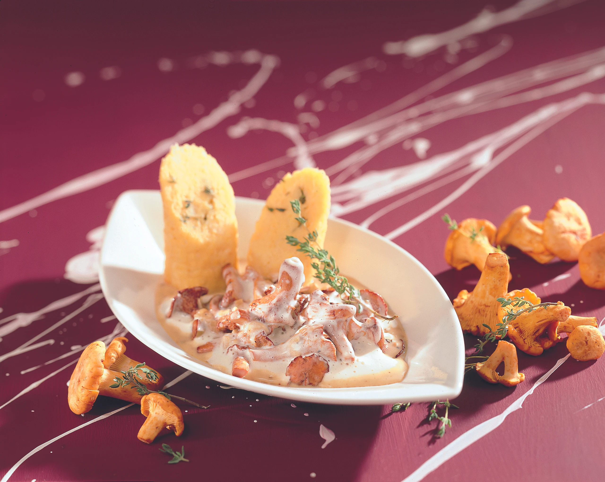 Eierschwammerl à la crème mit Erdäpfelroulade