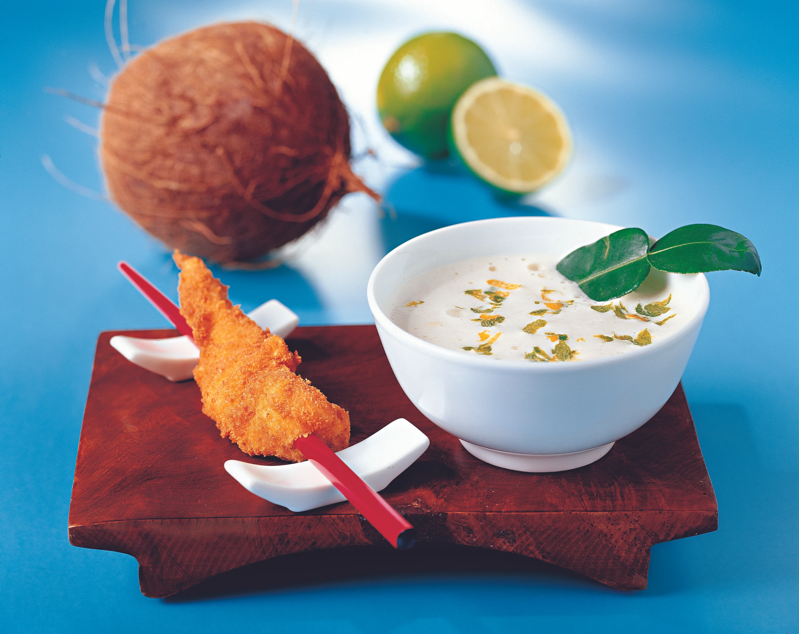 Kokos-Limettensuppe mit Zitrus-Backhendl