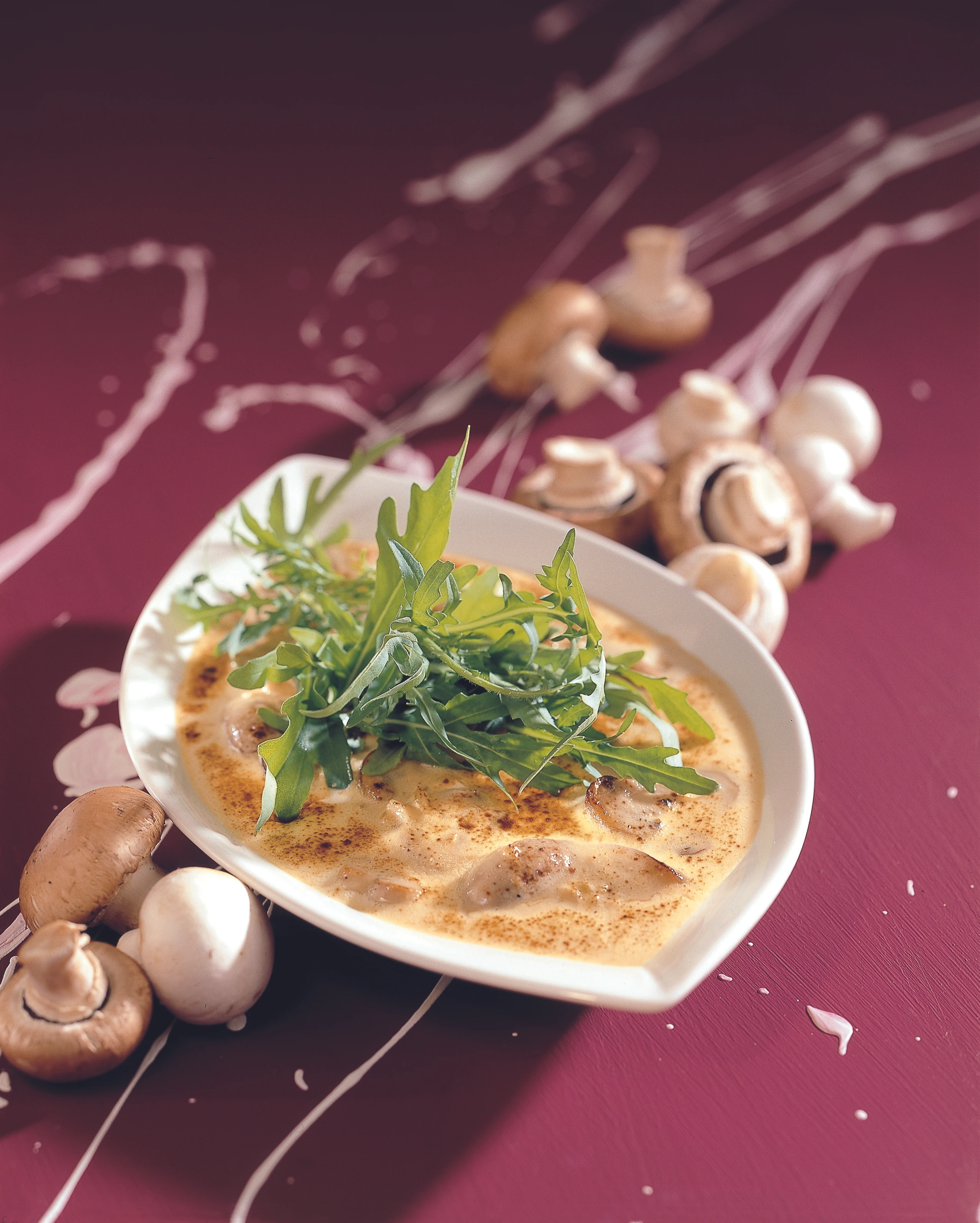 Überbackene Champignons mit Rucolasalat