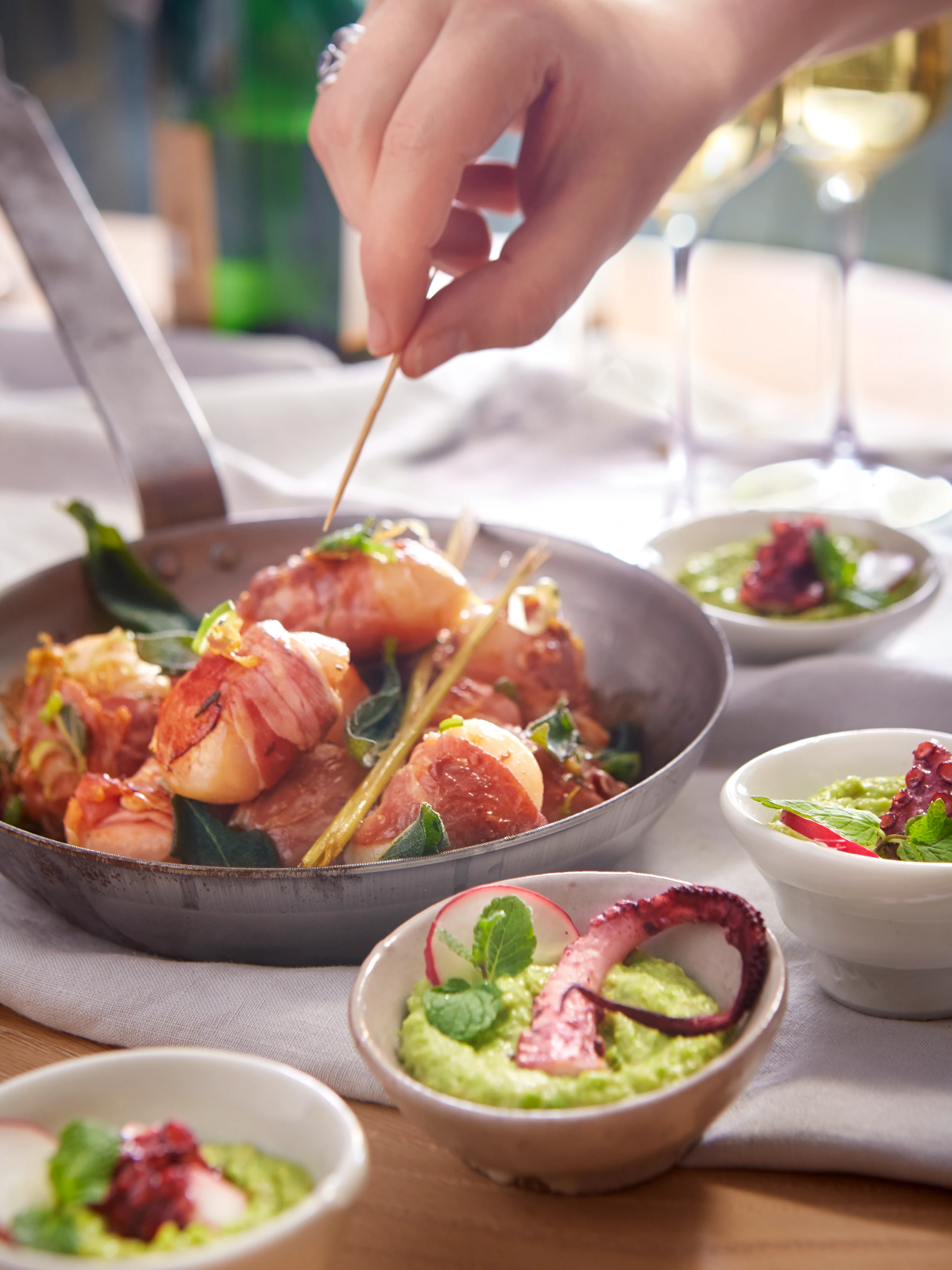 Pulpo mit Erbsen-Speck-Mash