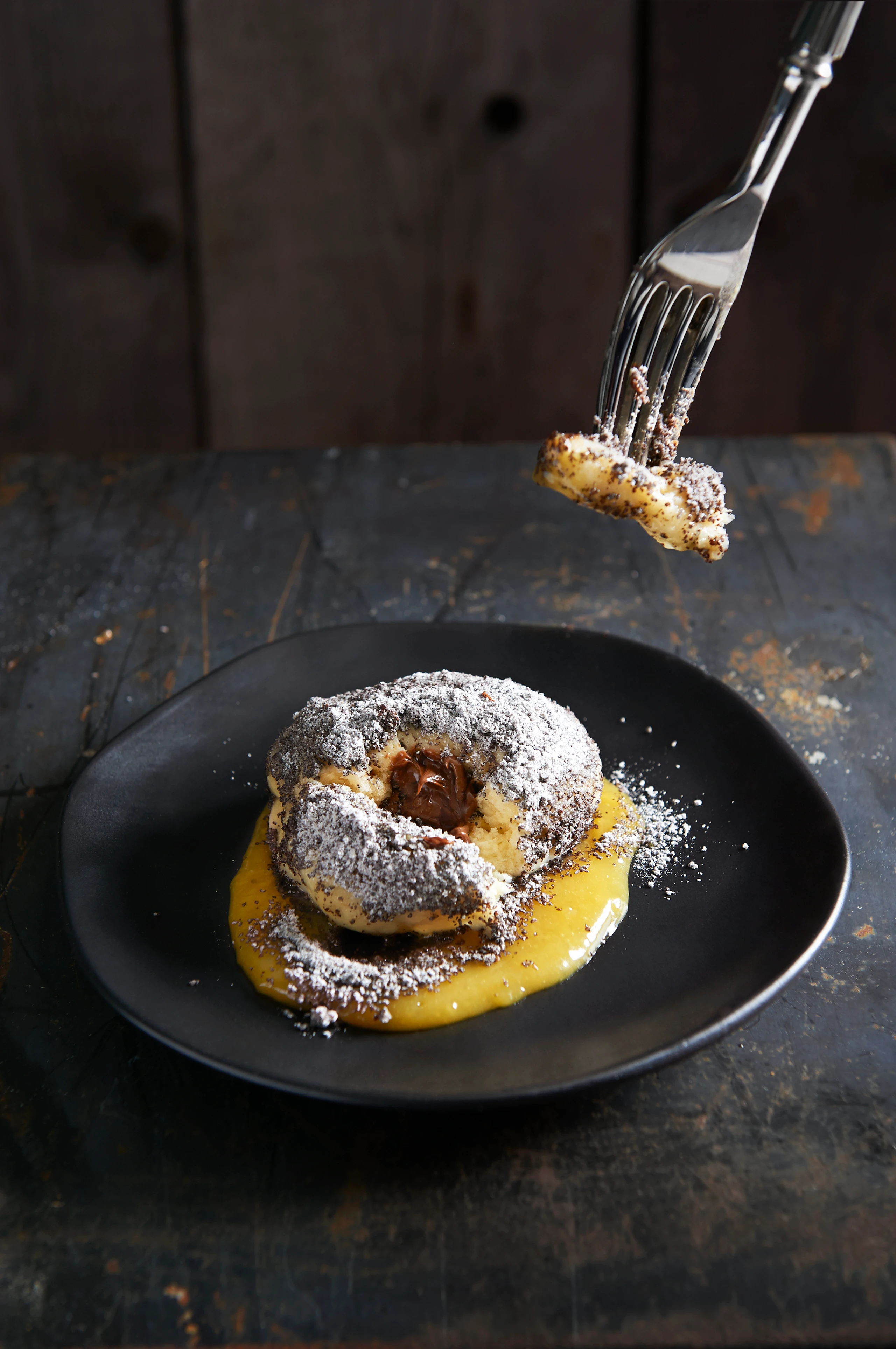 Mohnknödel mit Nougat und Orangensauce