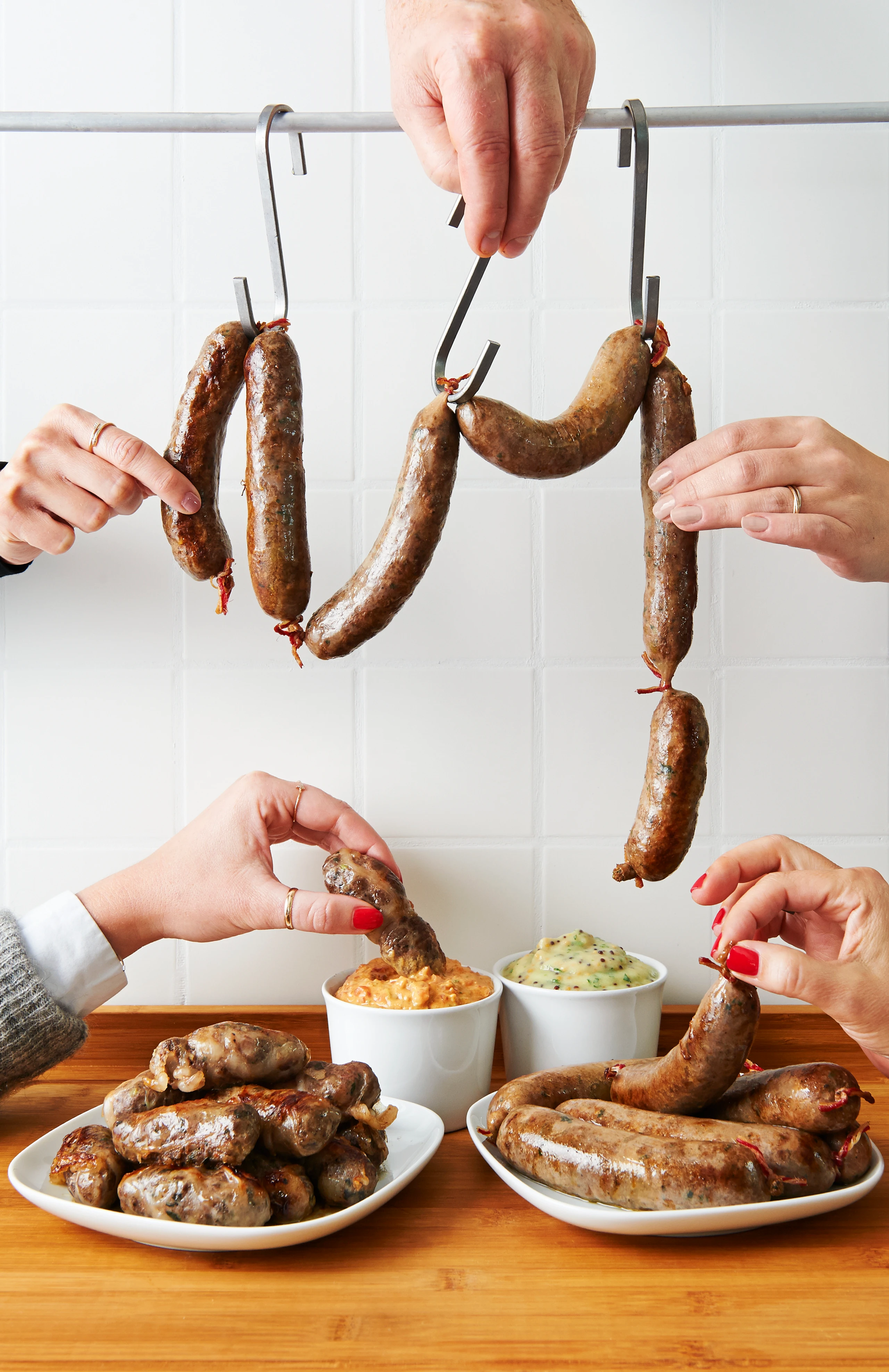 Wildschweinwürstchen mit Lardo