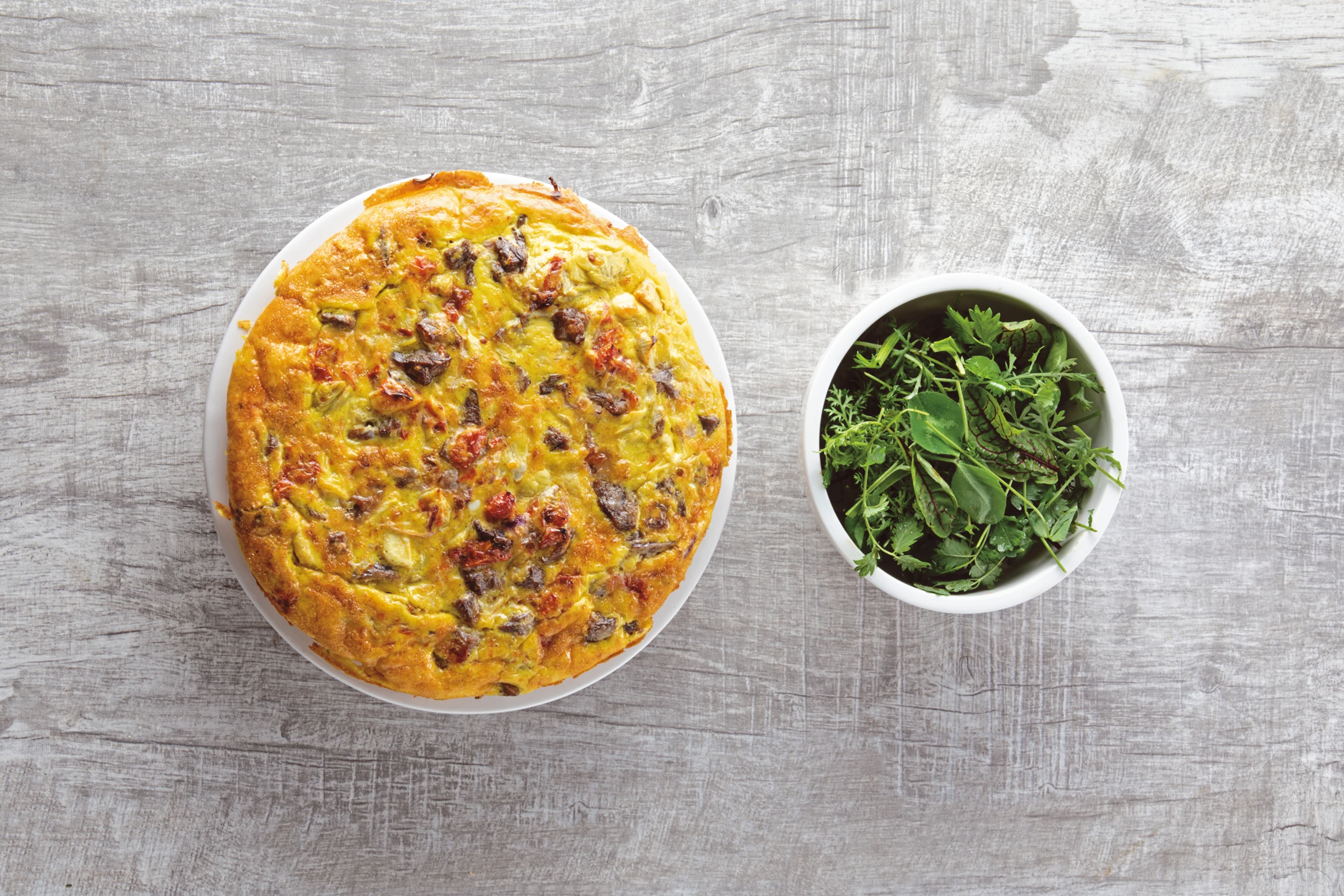 Frittata mit Braten, Artischocken und Paradeisern