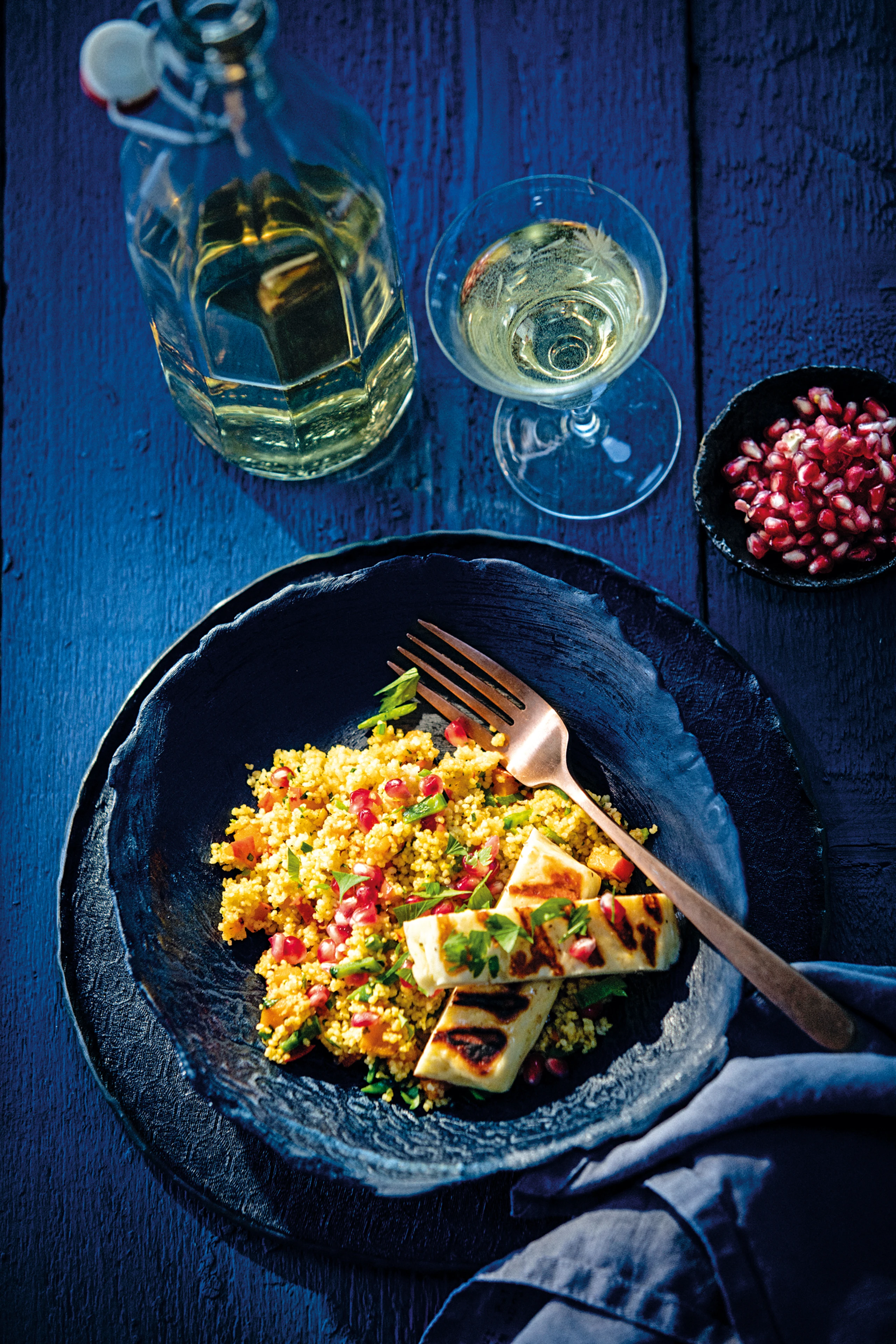 Kürbis-Couscous mit Granatapfel und Halloumi