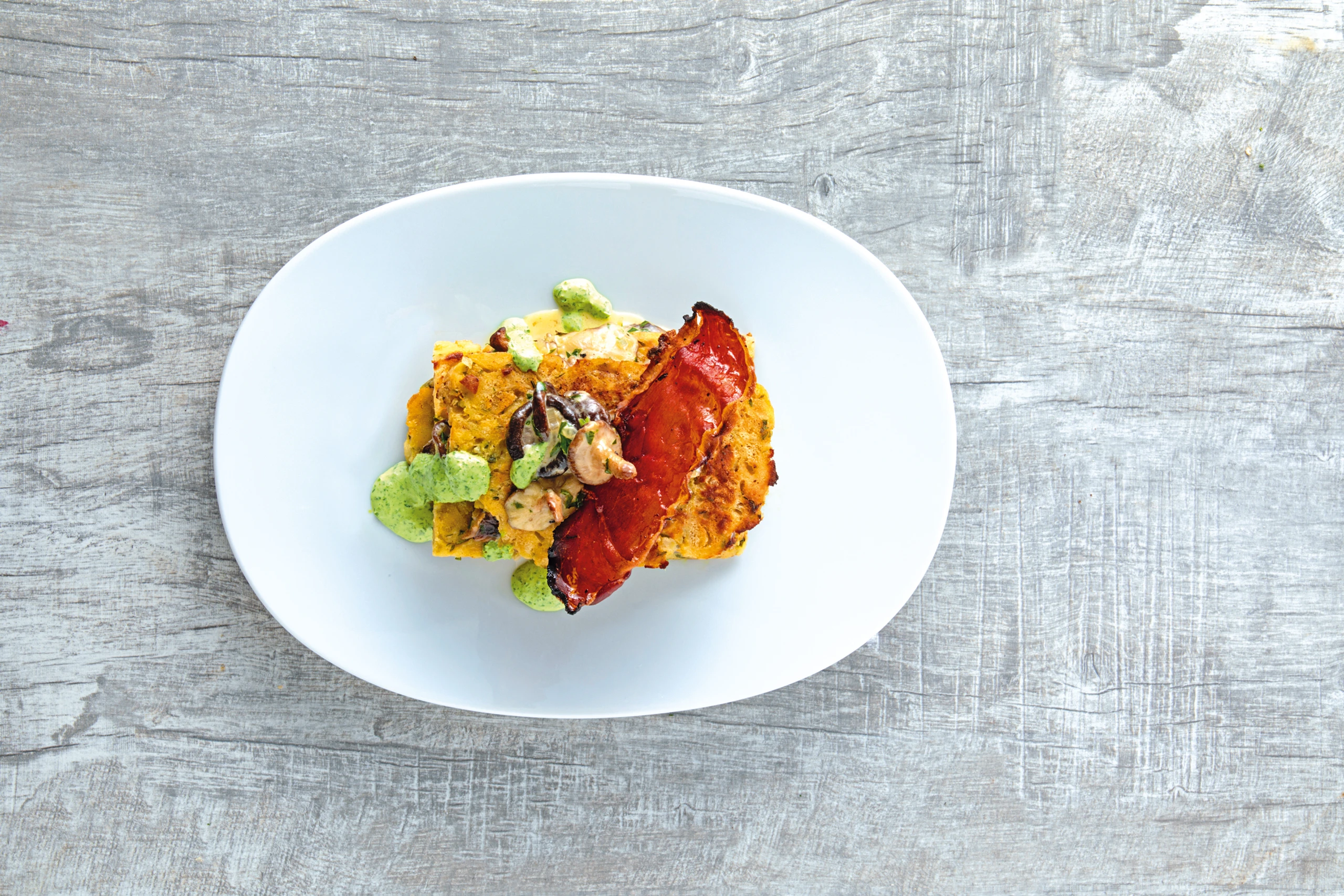 Knödellasagne mit Pilzen und Petersilsauce