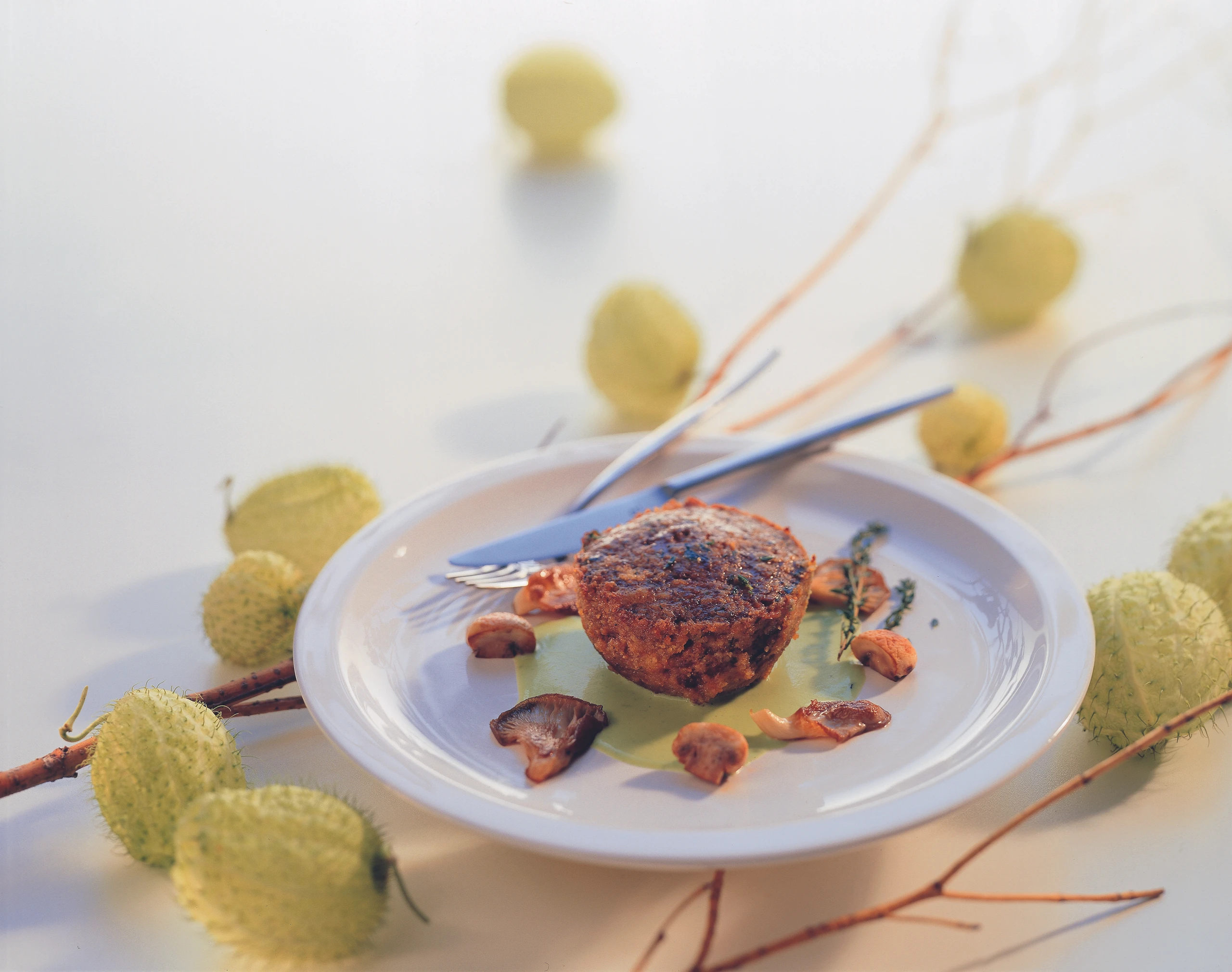 Rehauflauf mit Schwammerln und Petersilsauce