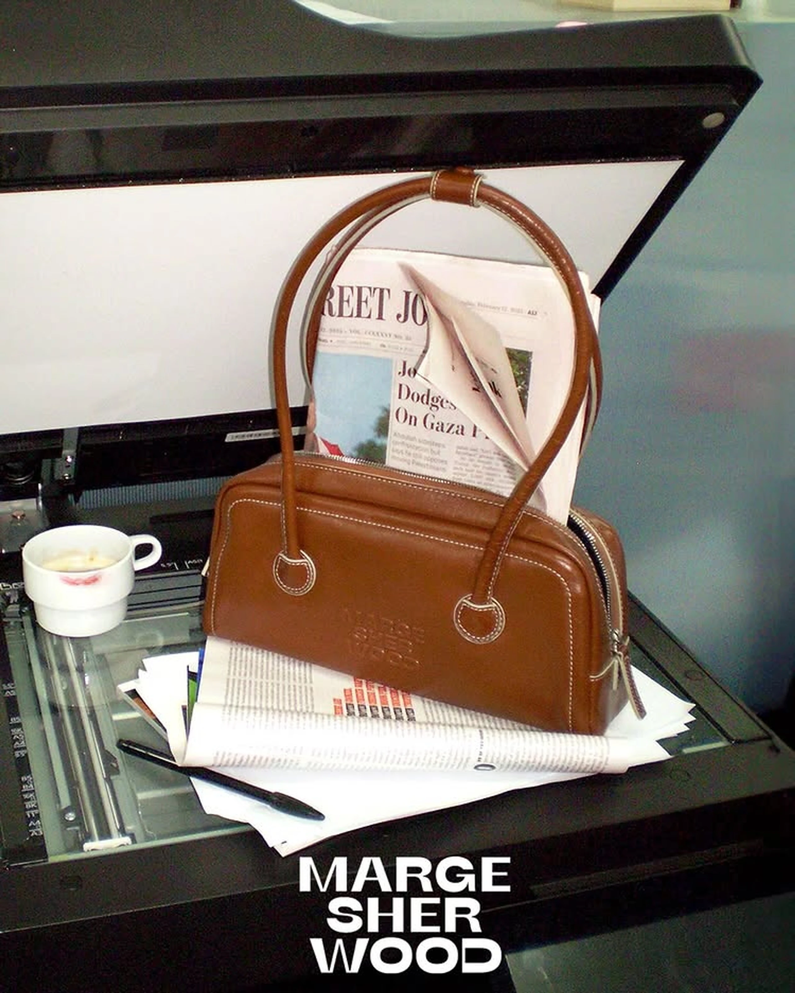 © Instagram/margesherwood_official Blurred image background