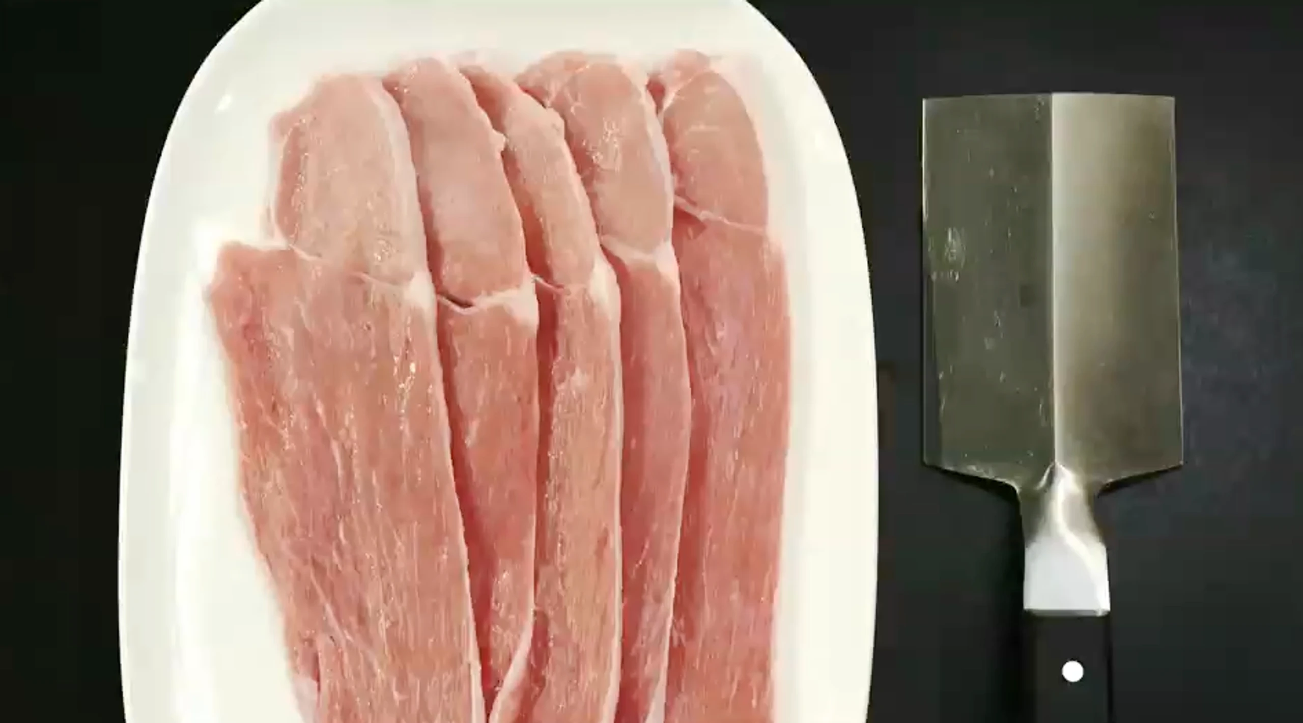 Kalbsschnitzel plattieren