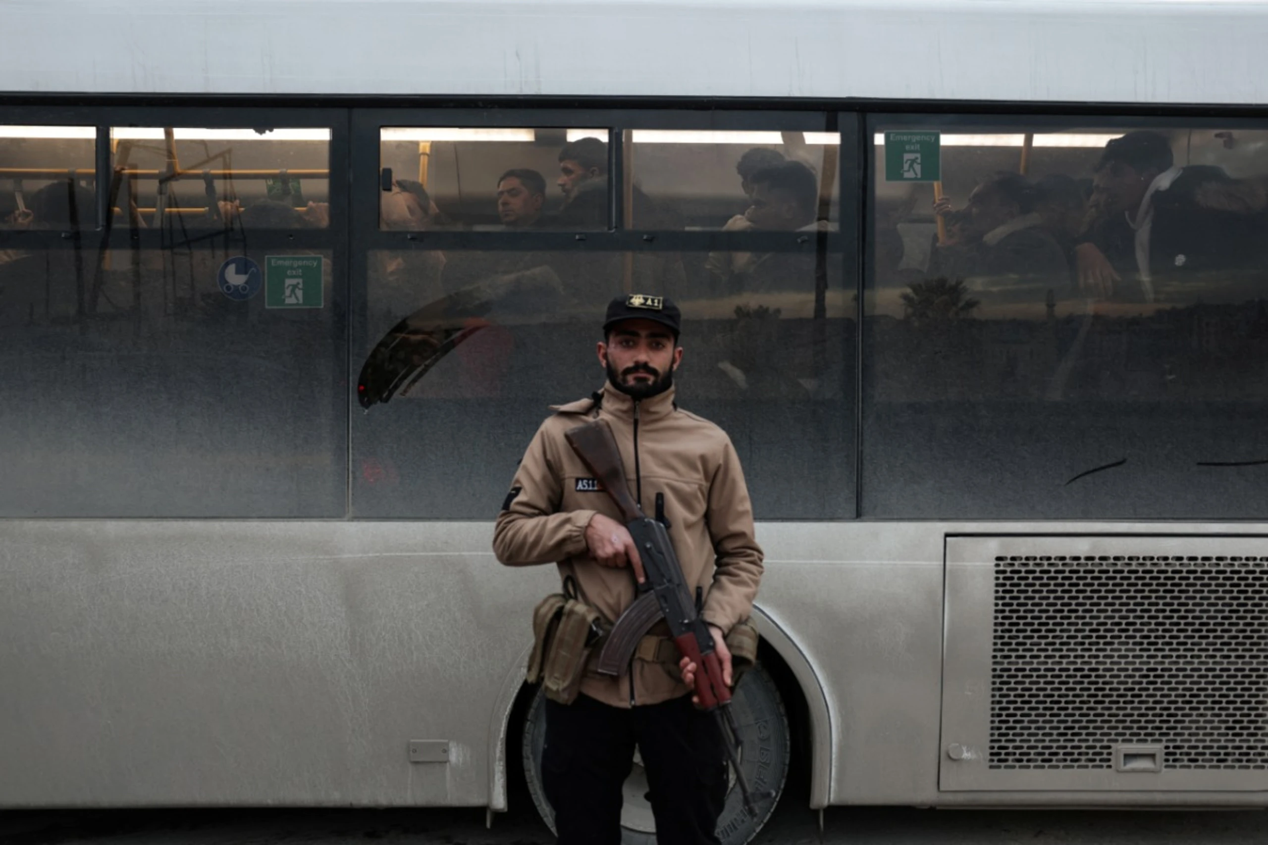 Busse brachten Kämpfer aus den kurdisch dominierten Stadtteilen weg