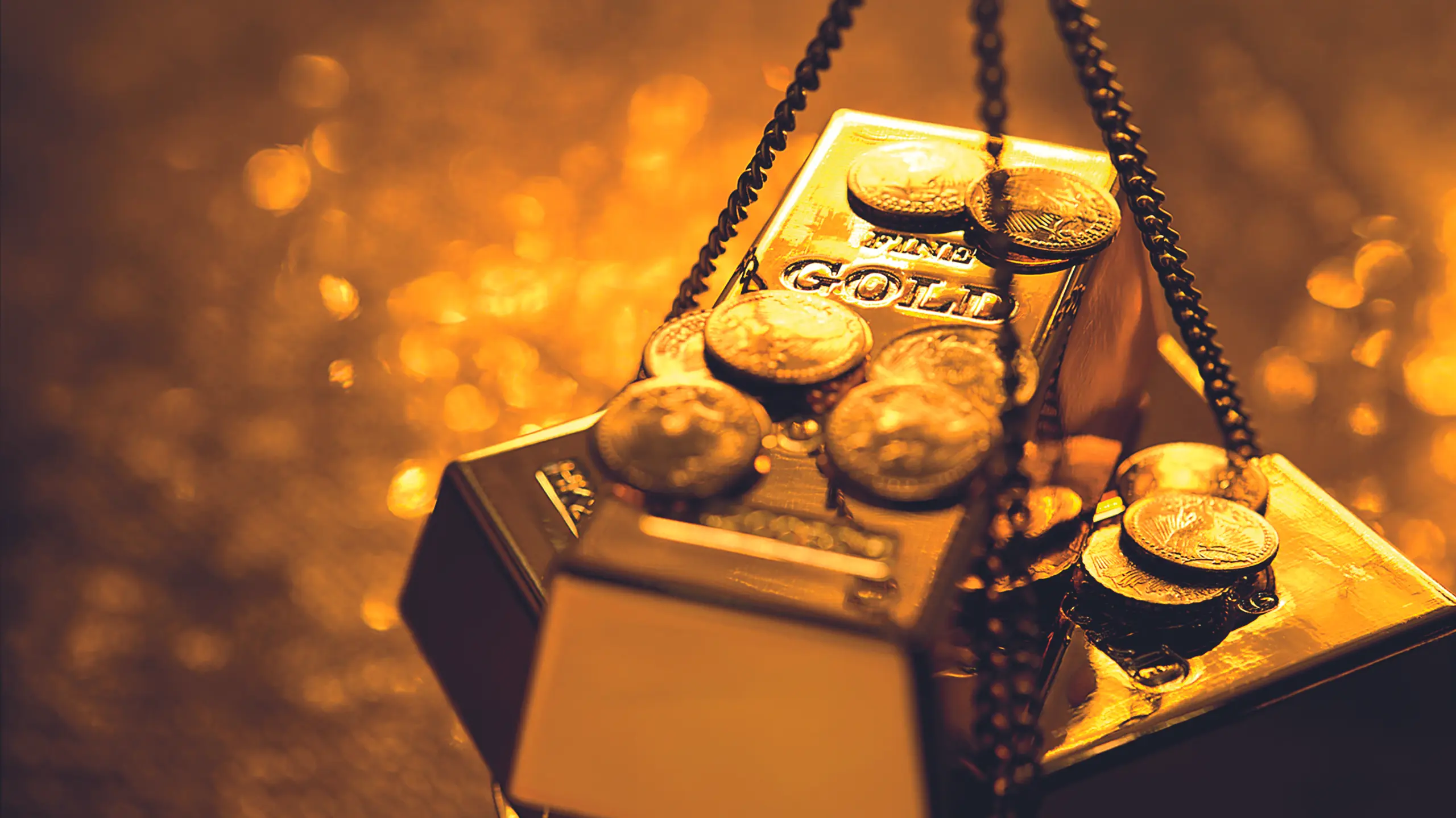 © ISTOCKPHOTO Golbdarren und Goldmünzen
