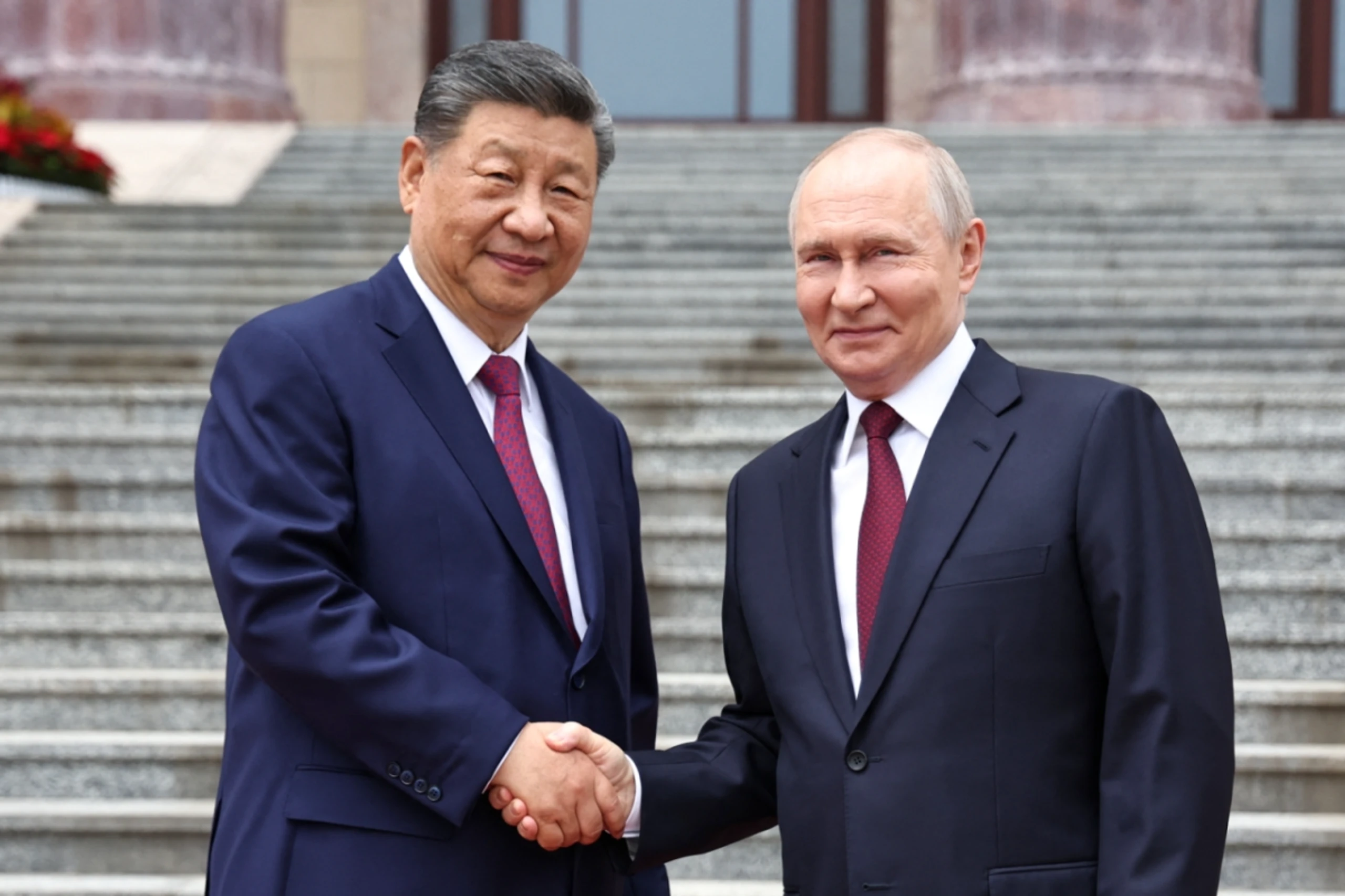 Putin (r.) bei Xi in Peking