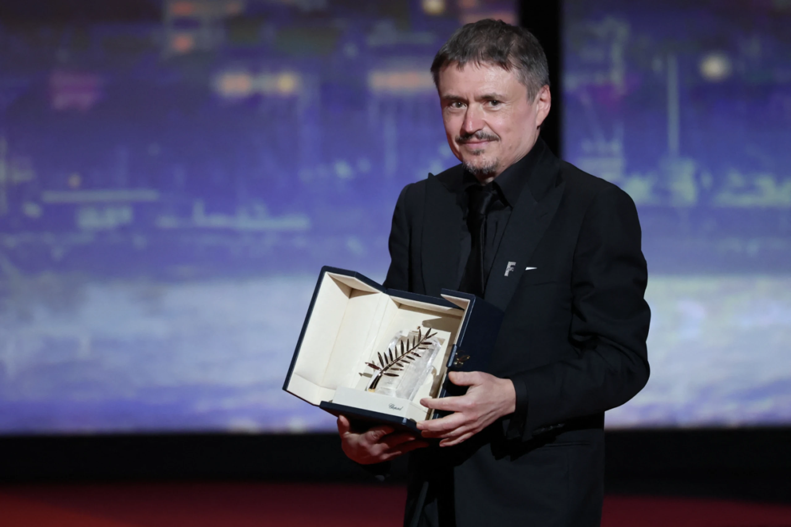 Regisseur Cristian Mungiu mit seiner Goldenen Palme