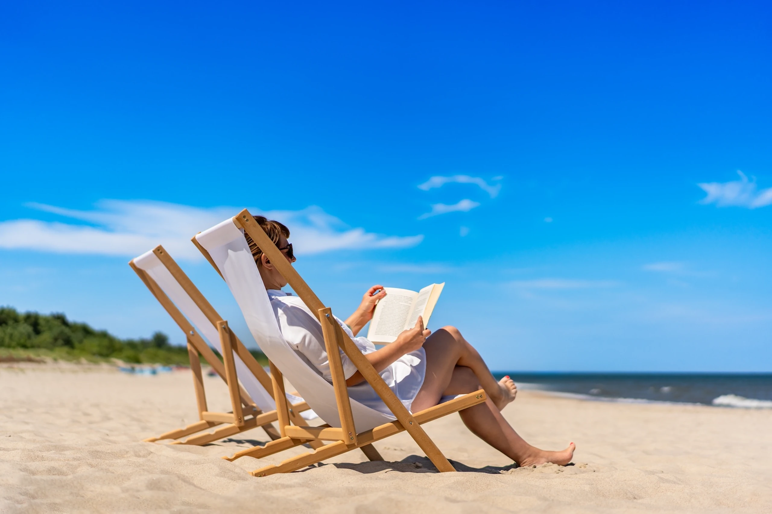 Was Topmanager:innen im Urlaub lesen