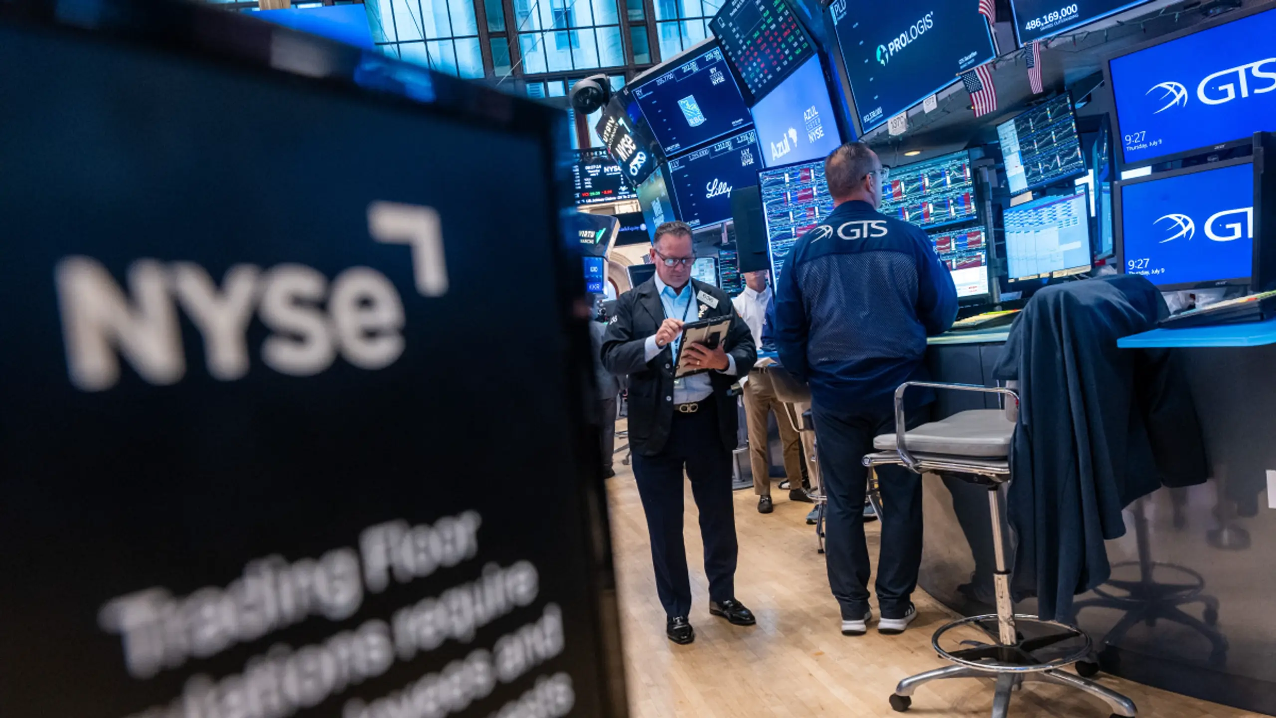 © APA/APA/GETTY IMAGES NORTH AMERICA/SPENCER PLATT Software-Entwickler am Donnerstag unter Druck