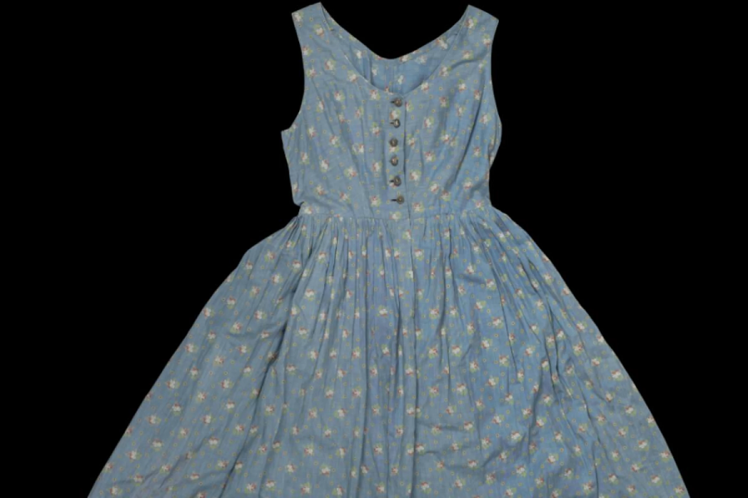 Ein Dirndl als Begleiterin in die neue Heimat