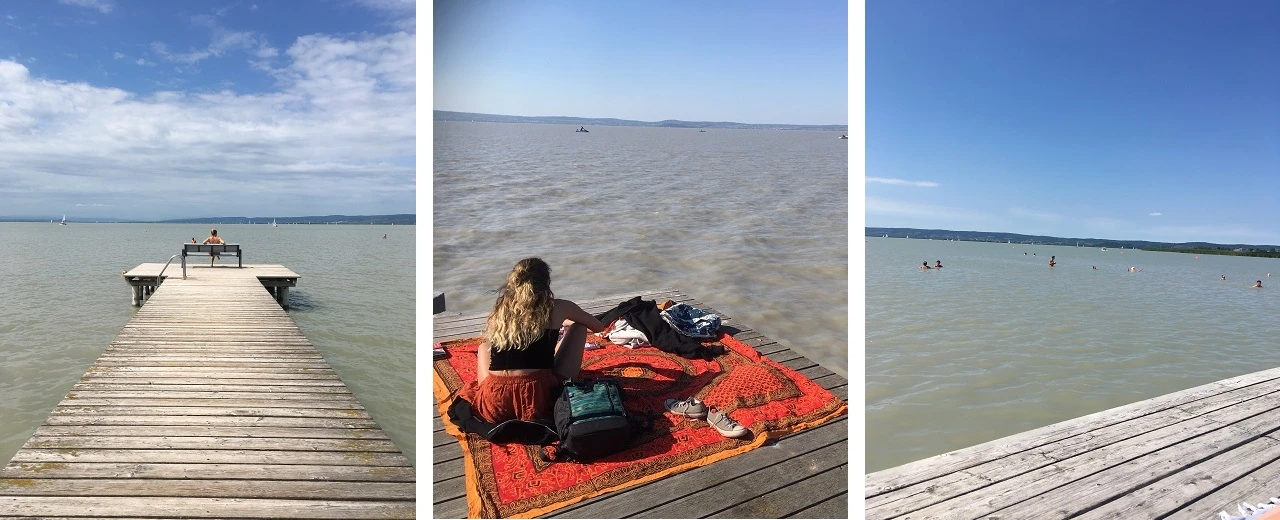 Sonniger Tag am See mit Steg, Badegästen & entspannten Personen.