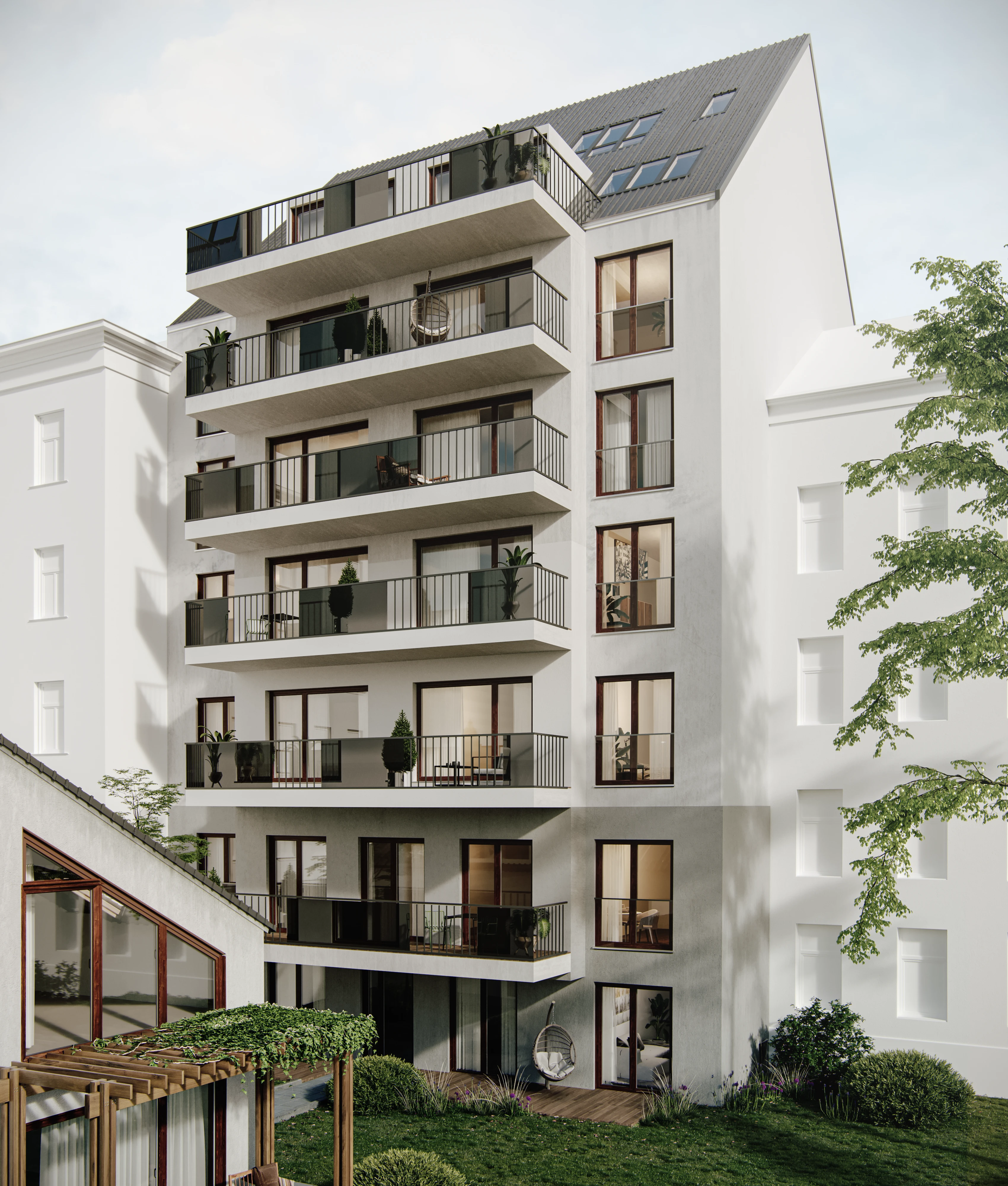 Fassade von Innenhof aus fotografiert mit Grünflächen